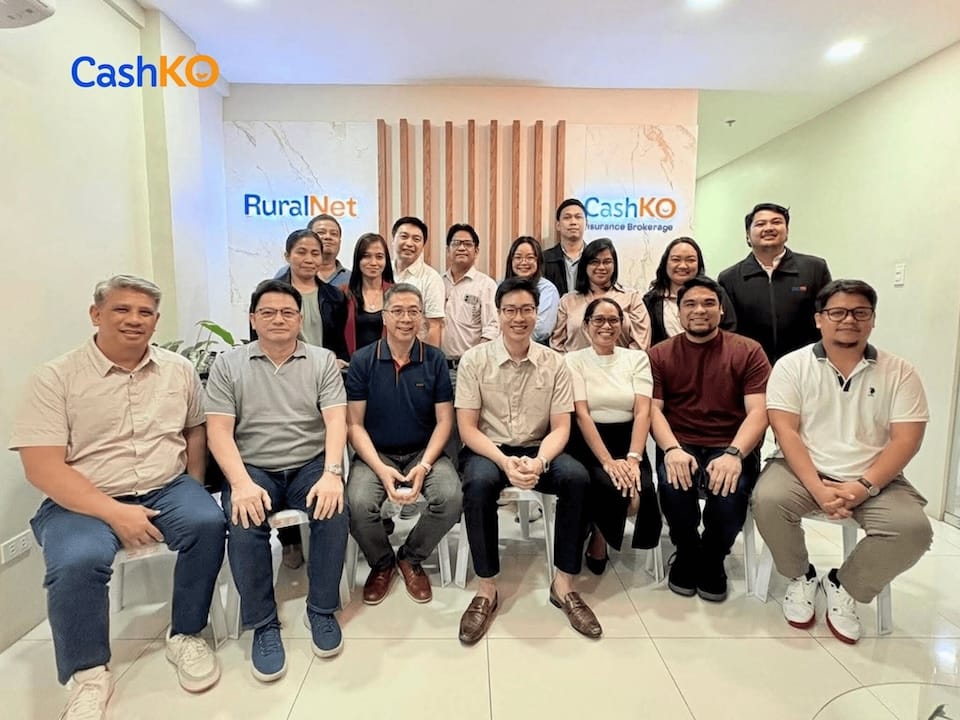 PR Photo #1 - A group photo of RuralNet Inc. with Founder & CEO Justin Arcenas (4th from left, seated)